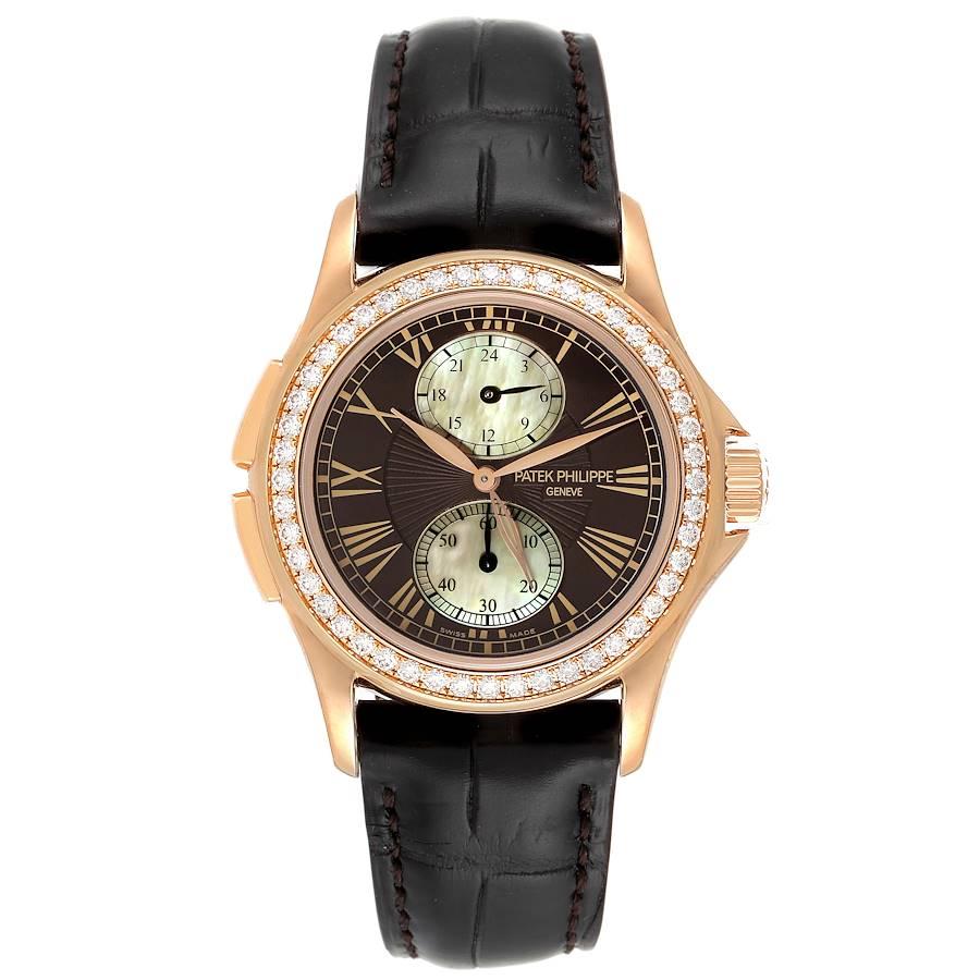 Patek Philippe Calatrava Travel Time Rose Gold MOP Diamond Watch 4934. Manual winding movement. 18k rose gold case 35.0 mm in diameter. Crown with protective shoulders, pusher at 10 and 8 o'clock to change time zone, screw-down sapphire crystal case