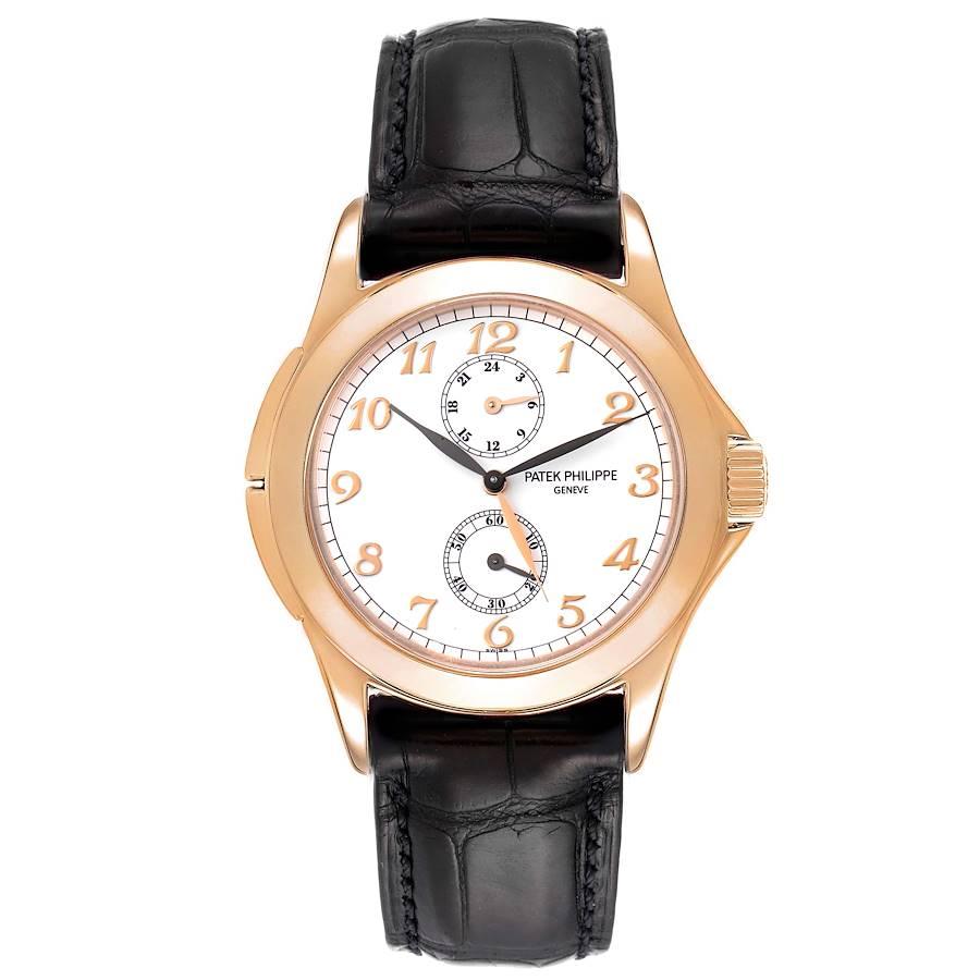 Patek Philippe Calatrava Travel Time Rose Gold White Dial Mens Watch 5134. Manual winding movement. 18k rose gold case 37.0 mm in diameter. Crown with protective shoulders, pusher at 10 and 8 o'clock to change time zone, screw-down sapphire crystal