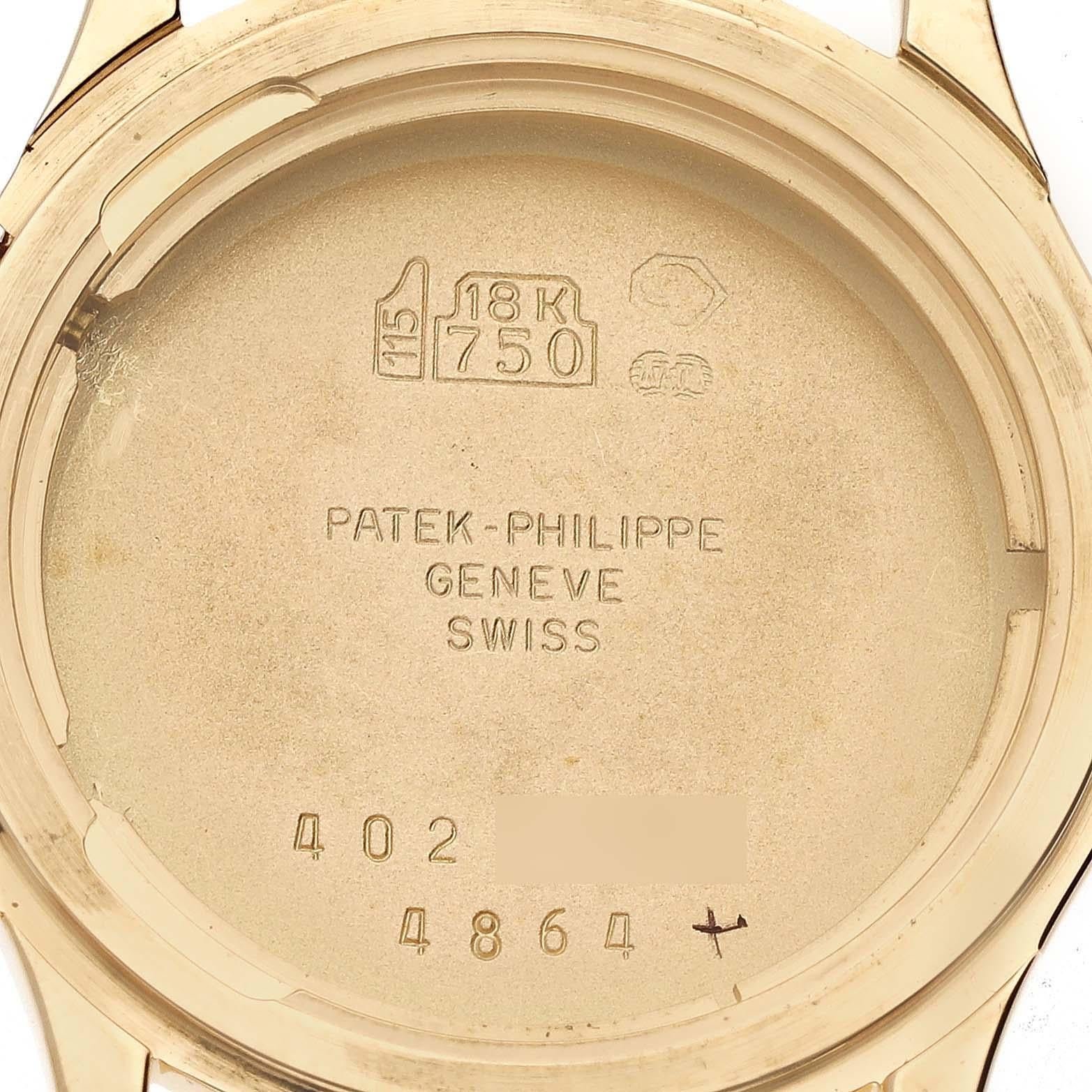 Women's Patek Philippe Calatrava Travel Time Yellow Gold Mens Watch 4864 For Sale