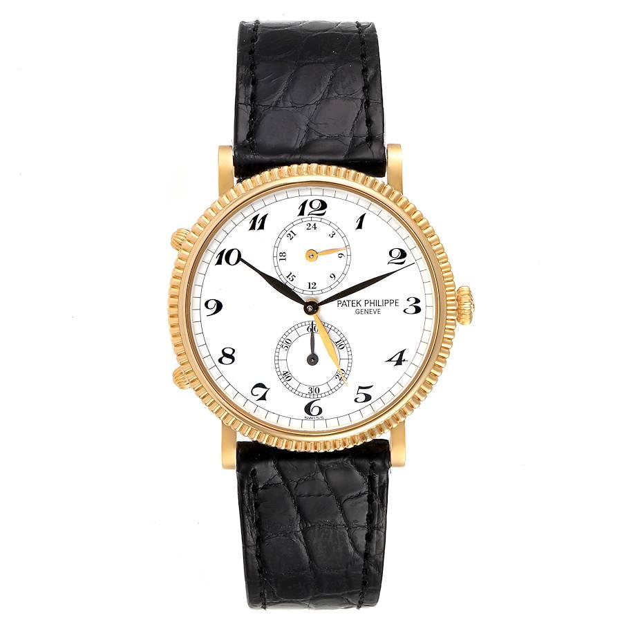 Patek Philippe Calatrava Travel Time Gelbgold Herrenuhr 5034 Box Papiere. Uhrwerk mit Handaufzug. Gestempelt mit dem Genfer Qualitätssiegel, rhodiniert, Dekoration 