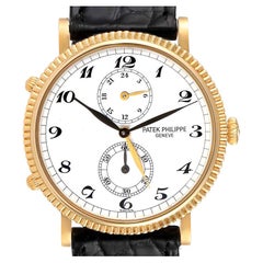 Gelbgold-Herrenuhr 5034 von Patek Philippe Calatrava mit Boxpapieren