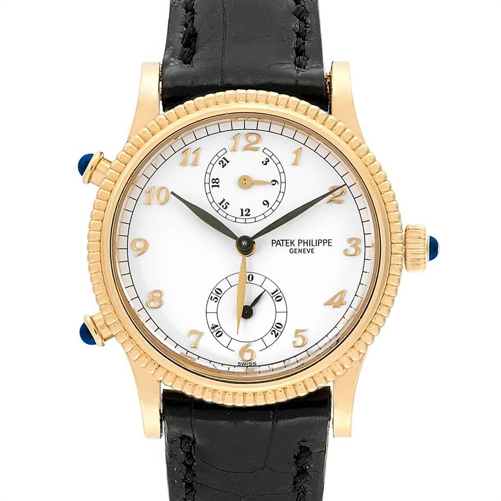Patek Philippe Calatrava Travel Time Yellow Gold Watch 4864 Box Papers. Manual winding movement. Stamped with the Seal of Geneva Quality Mark, rhodium-plated, fausses cotes decoration, straight-line lever escapement, Glucydur Gyromax balance shock