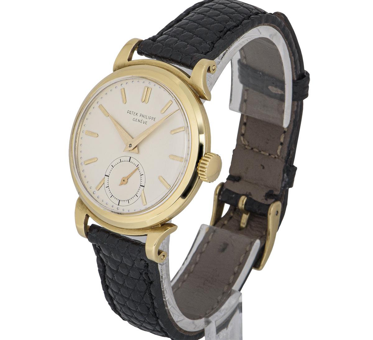 Gelbgold-Schnörkelgepäckstücke von Patek Philippe Calatrava im Vintage-Stil 1491 im Zustand „Hervorragend“ in Mayfair, London, London
