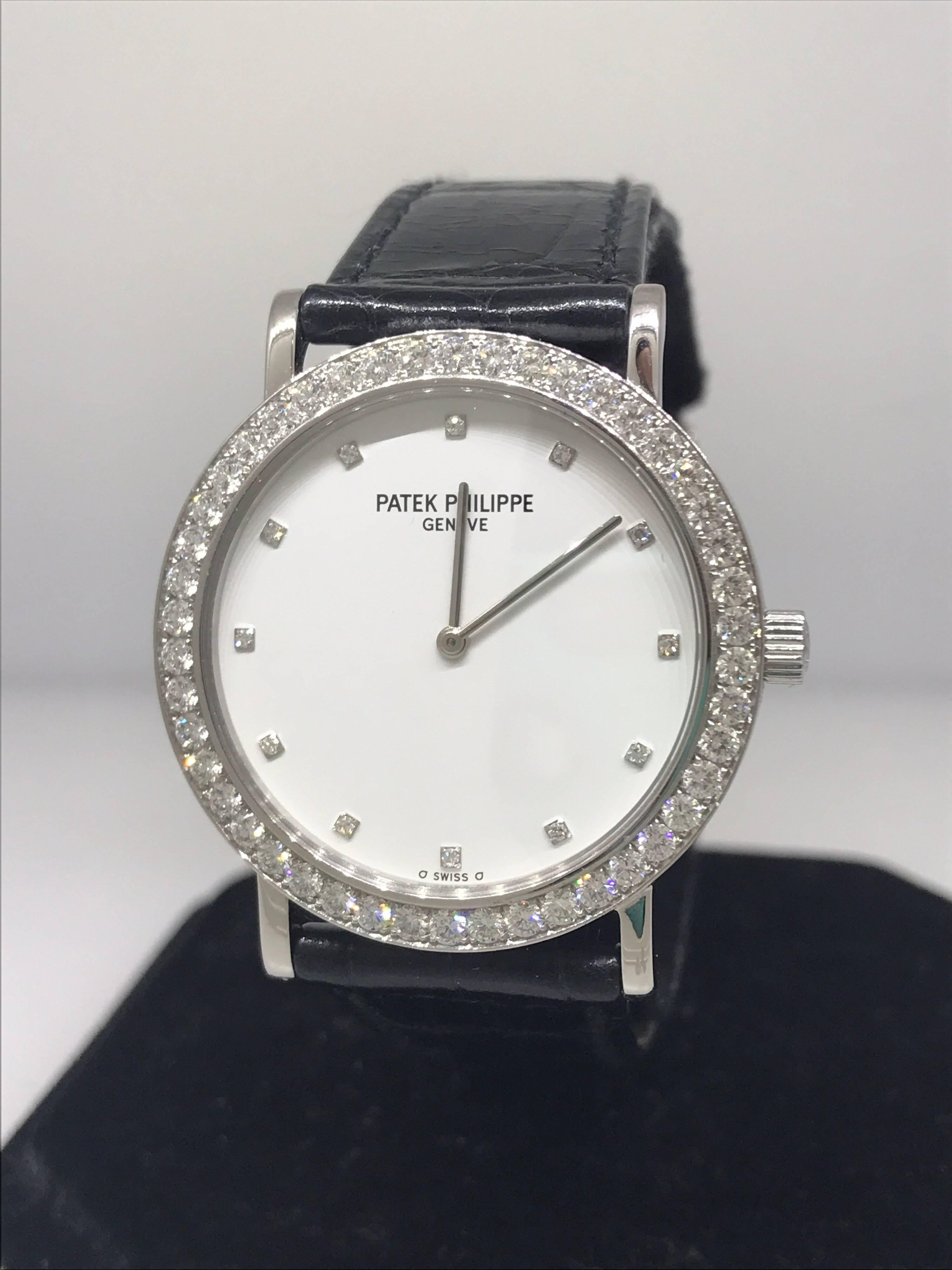 Patek Philippe Calatrava Ladies Watch

Model Number: 5006G

100% Authentic

Pre-owned - Pristine Condition

Comes with original Patek Philippe box and instruction manual

18 Karat White Gold Case & Buckle

Sapphire Crystal

Diamond Bezel 

White