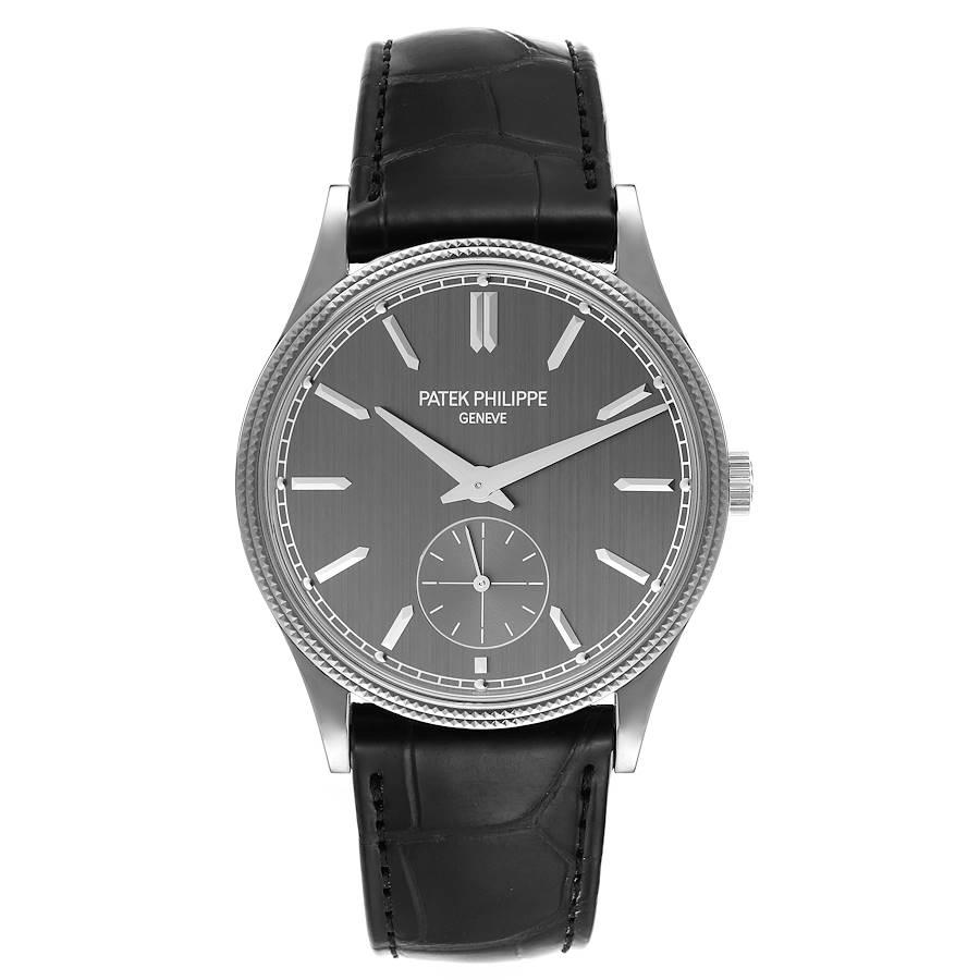 Patek Philippe Calatrava White Gold Black Strap Mens Watch 6119 Papers. Manual winding movement. 18k white gold case 39.0 mm in diameter. Case thickness -- 8.0 mm. Exhibition case back. 18k white gold hobnail bezel. Scratch resistant sapphire