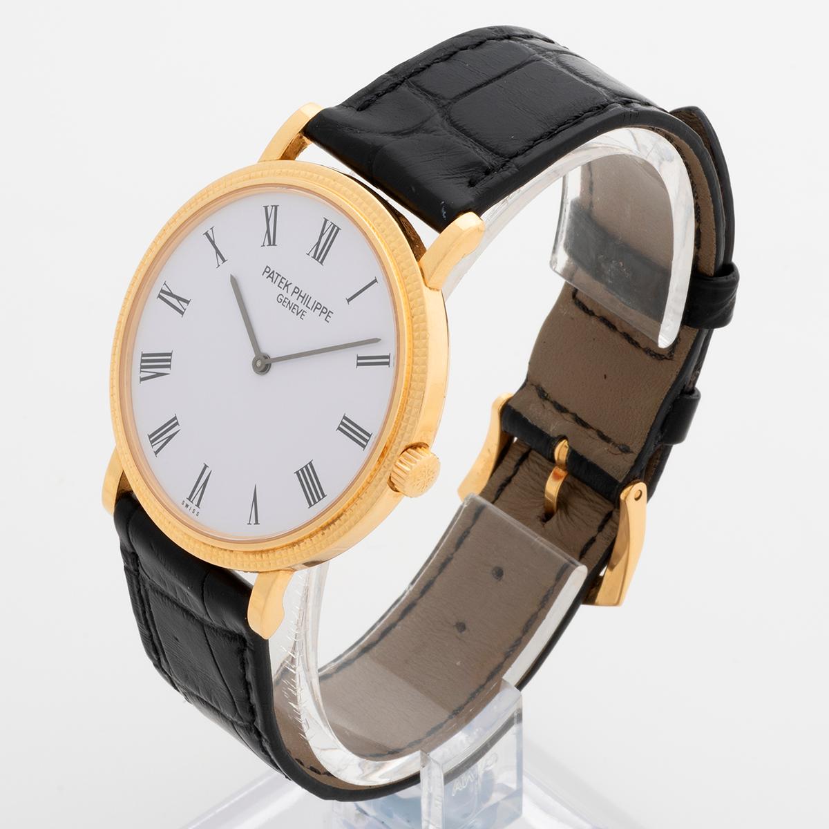 Patek Philippe Calatrava Wristwatch Ref 5120J, 18K Yelow Gold, White Enamel Dial 1