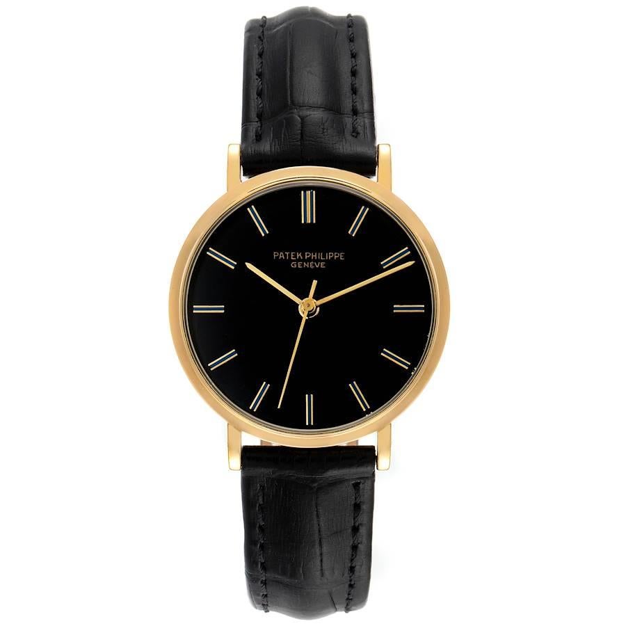 Vintage Herrenuhr 3569 von Patek Philippe Calatrava, Gelbgold, schwarzes Zifferblatt Manuales Aufzugswerk, Kaliber 350, gestempelt mit der Qualitätsmarke von Genf, rhodiniert, Fausses-Kote-Dekor, 28 Steine, gerader Hebelhemmung, Gyromax- balance