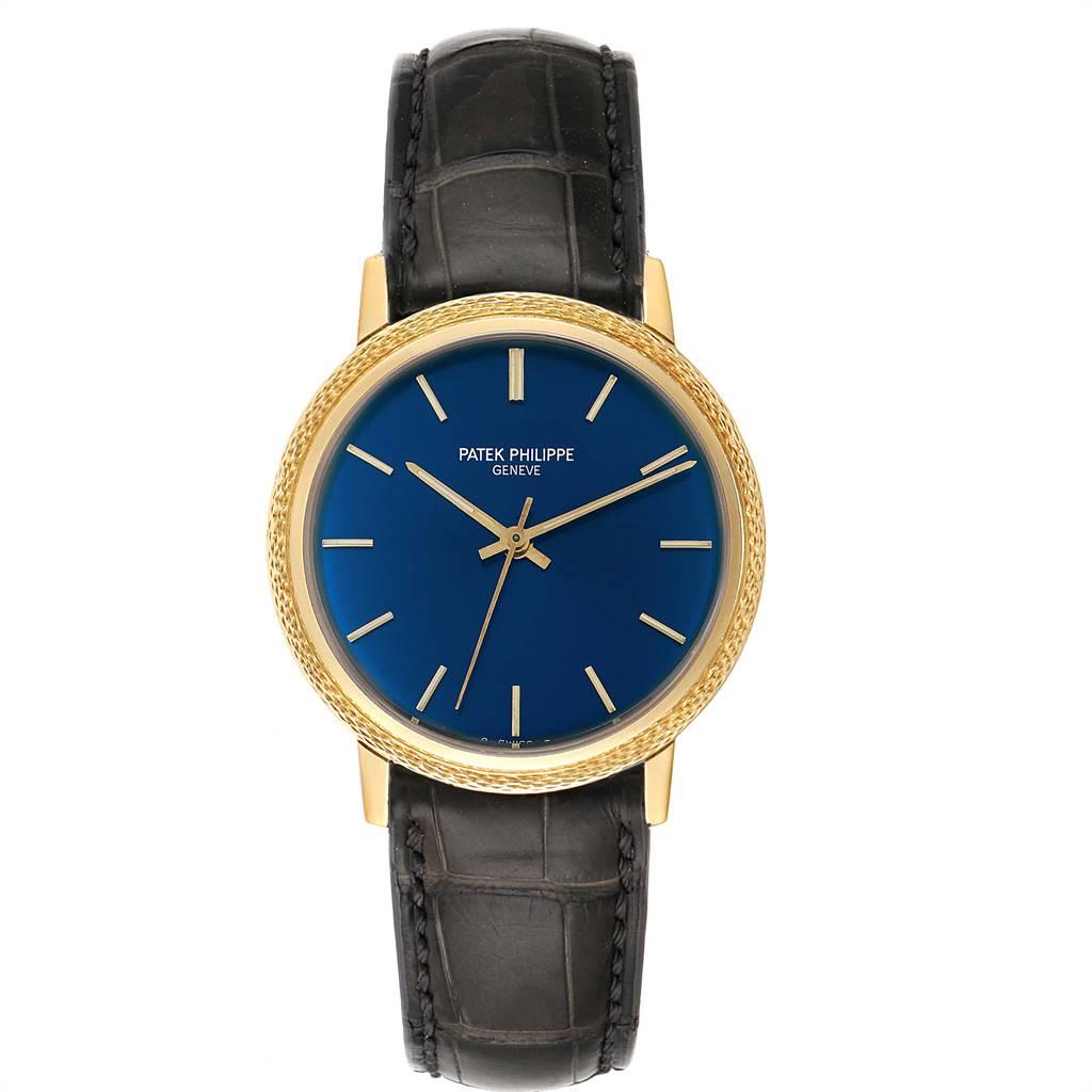 Patek Philippe Calatrava Yellow Gold Blue Dial Vintage Mens Watch 3569. Automatic self-winding movement, Caliber 350, stamped with the Seal of Geneva quality mark, rhodium-plated, fausses cotes decoration, 28 jewels, straight-line lever escapement,