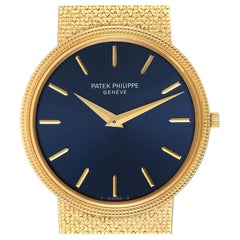 Vintage Herrenuhr von Patek Philippe Calatrava mit gelbgoldblauem Zifferblatt 3611 Papiere