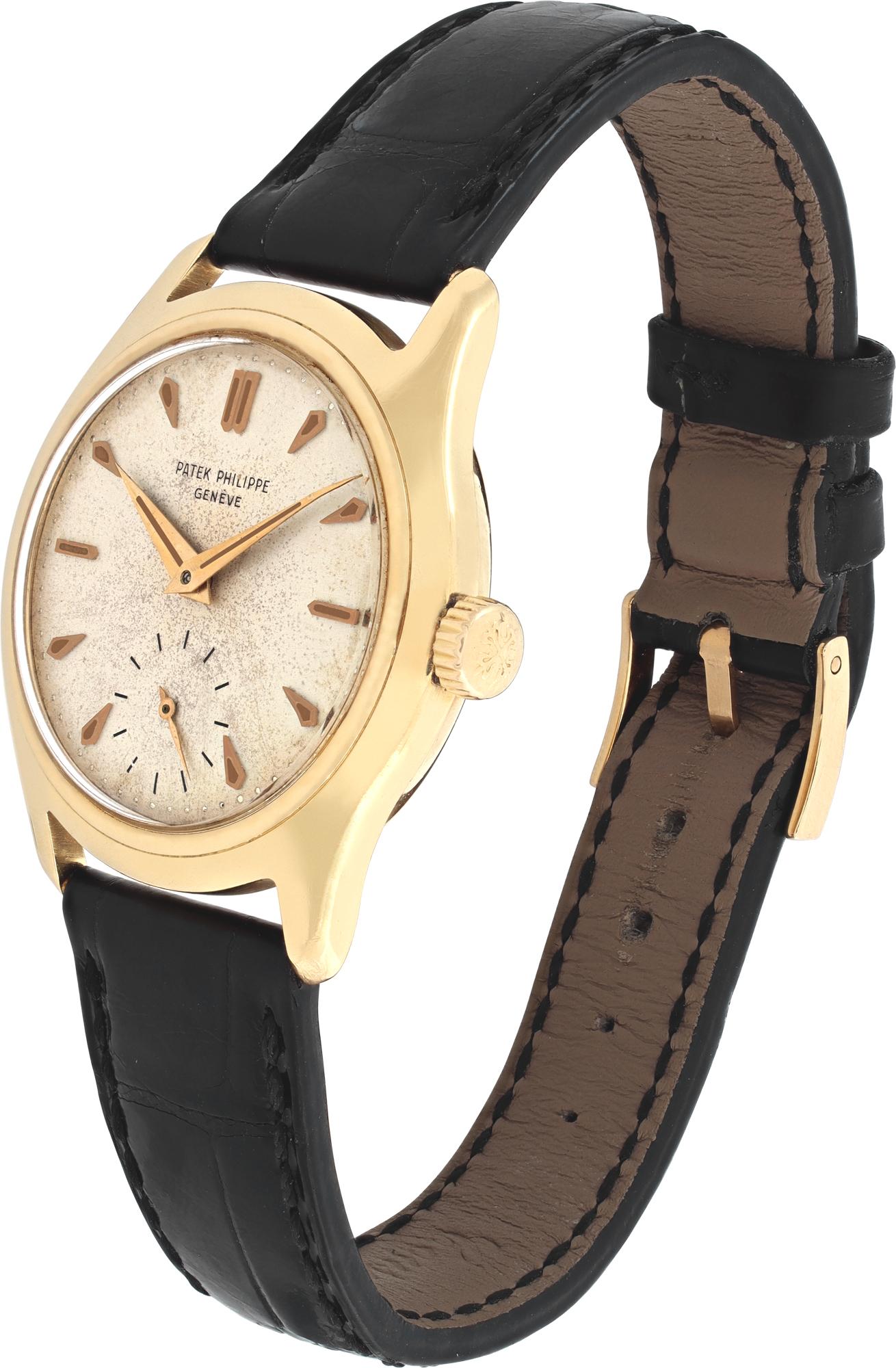 Vintage Patek Philippe Calatrava in 18k yellow gold on an original Patek Philippe black alligator strap and original 18k yellow gold PP tang buckle. 18 jewels manual wind movement with sub-seconds. Screw back case with a interior dust cover. Dial is