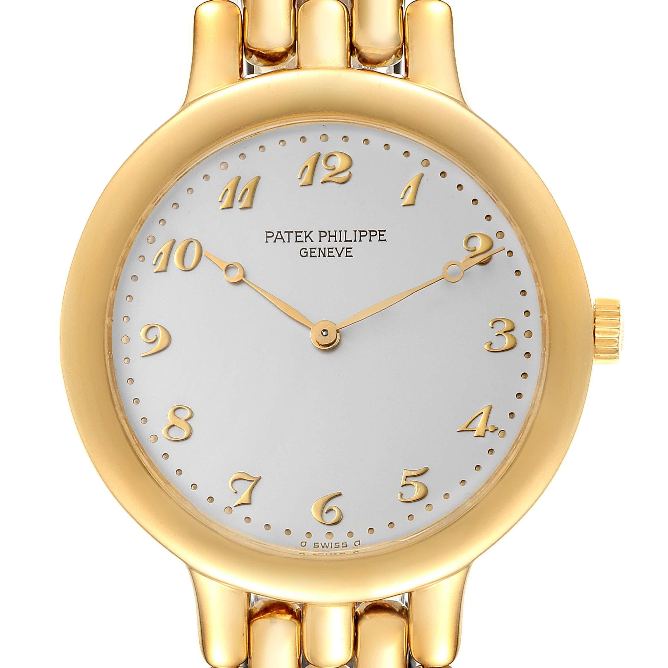 Patek Philippe Calatrava Yellow Gold Silver Arabic Dial Mens Watch 3915. Manual winding movement. Rhodium-plated, fausses cotes decoration stamped with the Seal of Geneva quality mark, straight-line lever escapement, Gyromax balance adjusted to