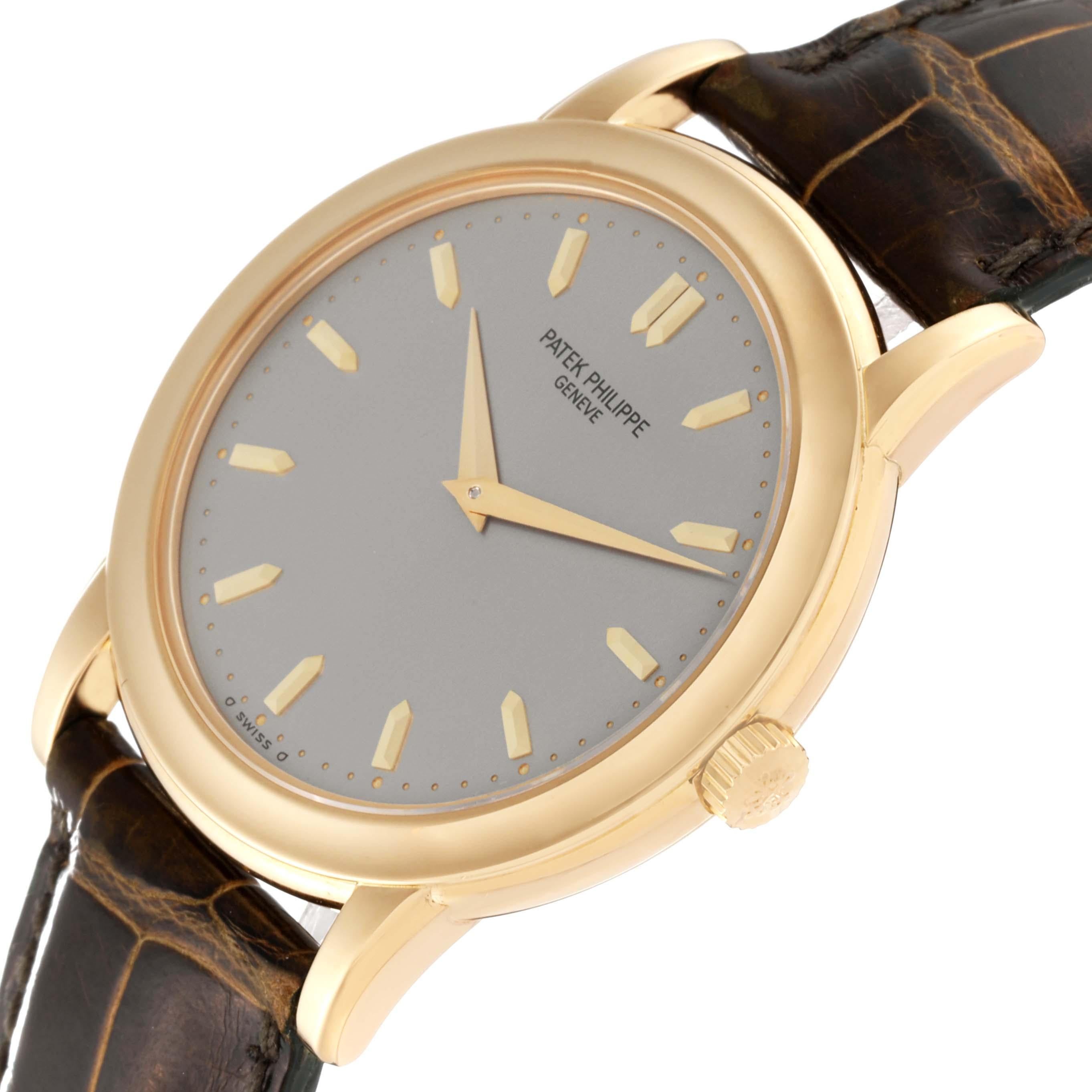 Patek Philippe Calatrava Yellow Gold Silver Dial Mens Watch 5032. Automatic self winding movement. 18k yellow gold case 36.0 mm in diameter. 18k yellow gold bezel. Scratch resistant sapphire crystal. Silver opaline dial with faceted yellow gold