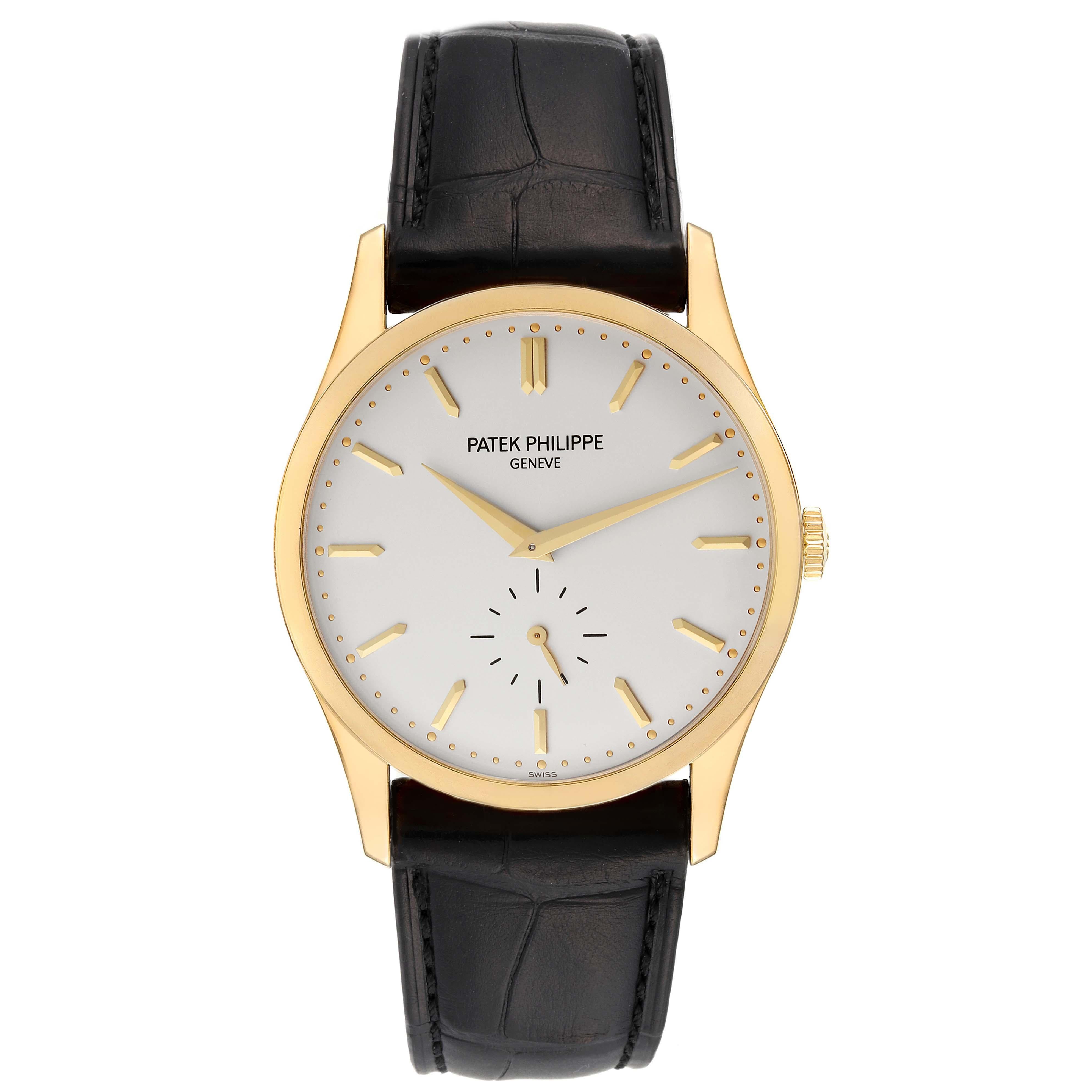 Patek Philippe Calatrava Yellow Gold Silver Dial Mens Watch 5196. Manual-winding movement. Rhodium-plated, fausses cotes decoration, straight-line lever escapement, Gyromax balance adjusted to heat, cold, isochronism and 5 positions, shock absorber,