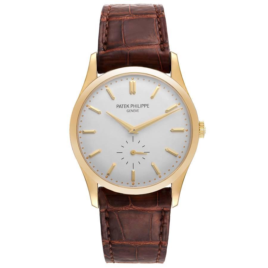 Patek Philippe Calatrava Yellow Gold Silver Dial Mens Watch 5196J. Manual-winding movement. Rhodium-plated, fausses cotes decoration, straight-line lever escapement, Gyromax balance adjusted to heat, cold, isochronism and 5 positions, shock