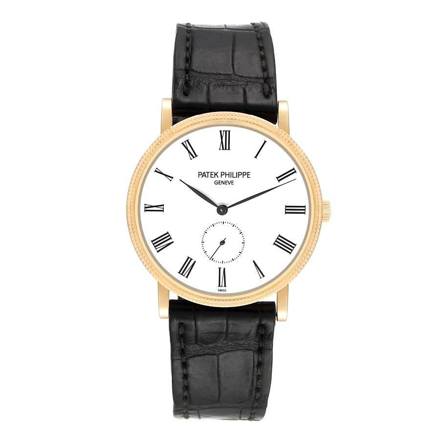 Patek Philippe Calatrava Yellow Gold White Dial Mens Watch 5119j. Manual-winding movement. 18k yellow gold case 36.0 mm in diameter. Exhibition transparrent sapphire crystal case back. 18k yellow gold hobnail bezel. Scratch resistant sapphire