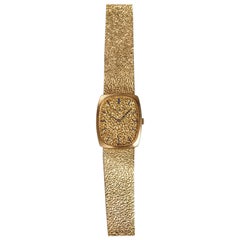 Reloj Patek Philippe de oro amarillo de 18 quilates con esfera de martillo de champán, años 70