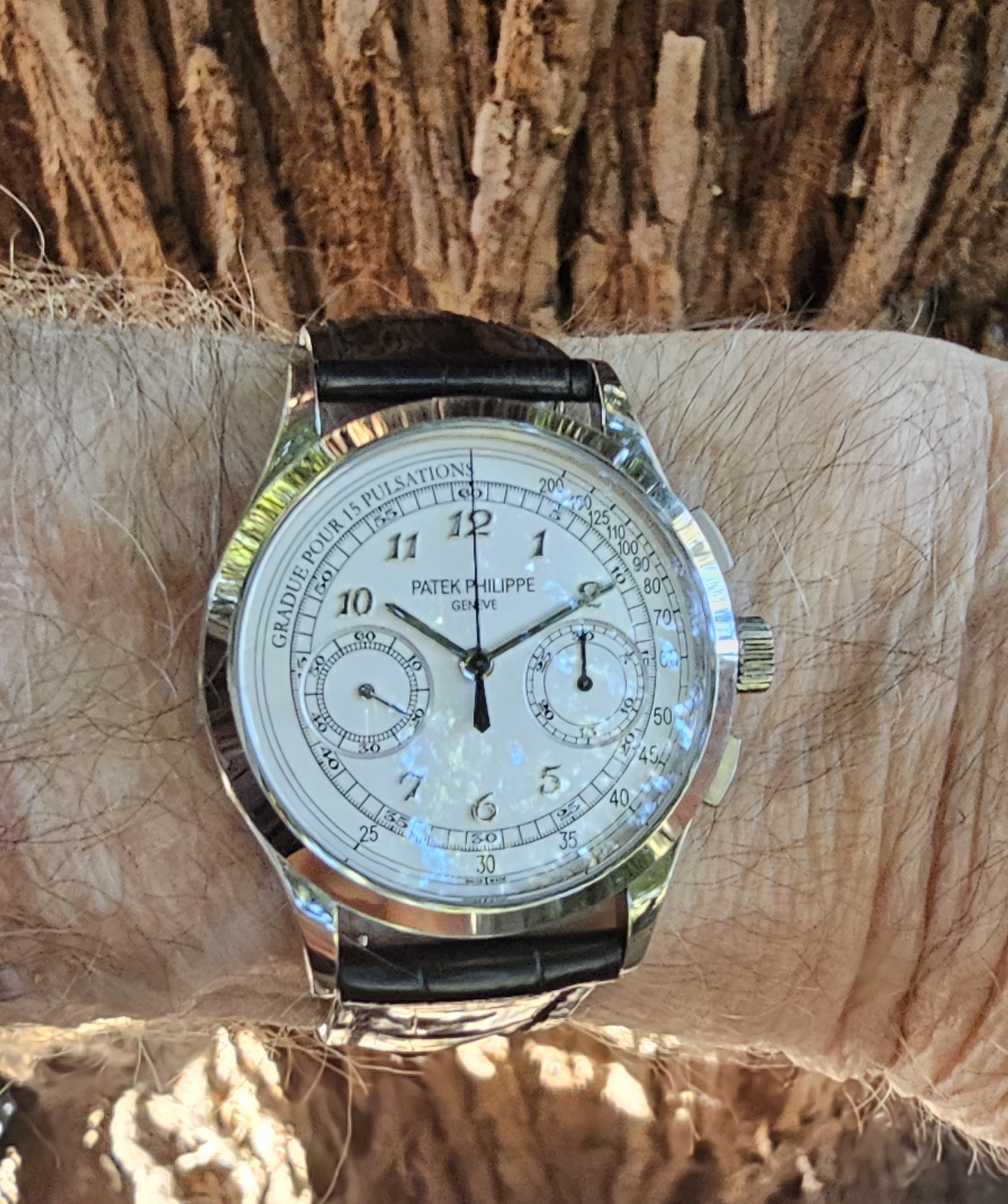 Patek Philippe Chronograph 5170G-001 manual-wind watch,The watch measures 39.5mm in diameter and is made in 18 karat White gold case with see through back,  The dial is Opaline Silver with raised white gold Breguet numbers and  pulsation indicators.