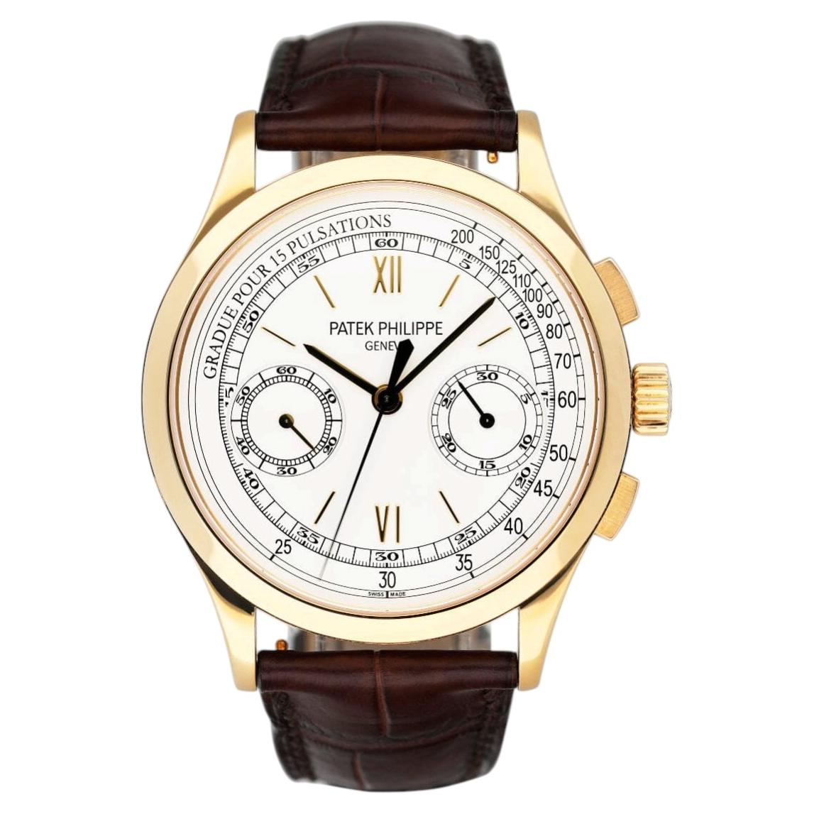 How do I manually wind a Patek Philippe?