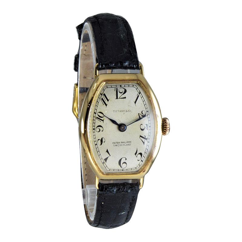 FACTORY / HOUSE: Patek Philippe & Cie.
STYLE / REFERENCE: Tonneau Shape / Gondolo Number 3
METAL / MATERIAL: 18Kt Yellow Gold
CIRCA / YEAR: 1918
DIMENSIONS / SIZE: 35mm x 23mm
MOVEMENT / CALIBER: Manual Winding / 18 Jewels 
DIAL / HANDS: Silvered