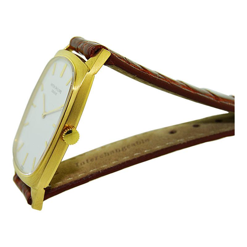 Patek Philippe & Cie 18 Karat Yellow Gold Tonneau Shaped Wrist Watch, circa 1975 1
