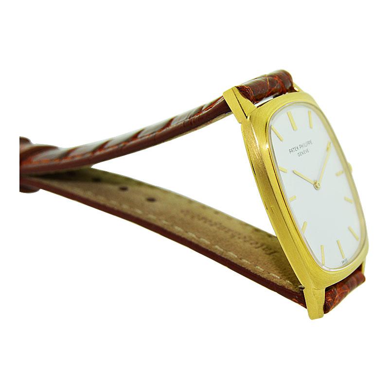 Patek Philippe & Cie 18 Karat Yellow Gold Tonneau Shaped Wrist Watch, circa 1975 4