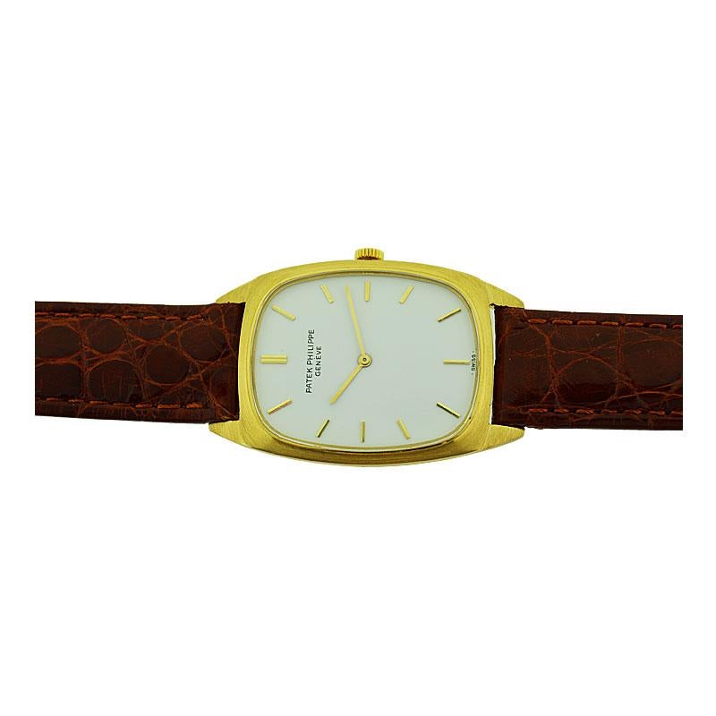 Patek Philippe & Cie 18 Karat Yellow Gold Tonneau Shaped Wrist Watch, circa 1975 5
