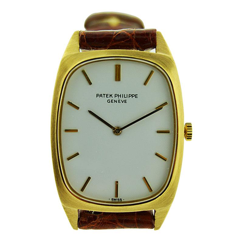 Patek Philippe & Cie 18 Karat Yellow Gold Tonneau Shaped Wrist Watch, circa 1975