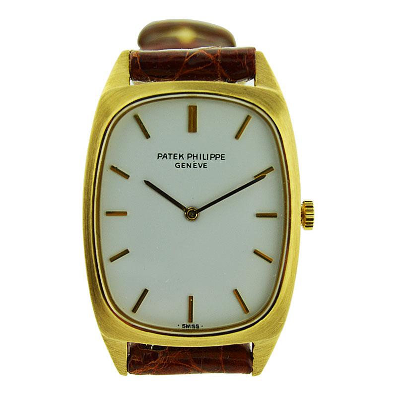 Patek Philippe 
Cie 18 Karat Yellow Gold Tonneau Shaped Wrist Watch, circa 1975