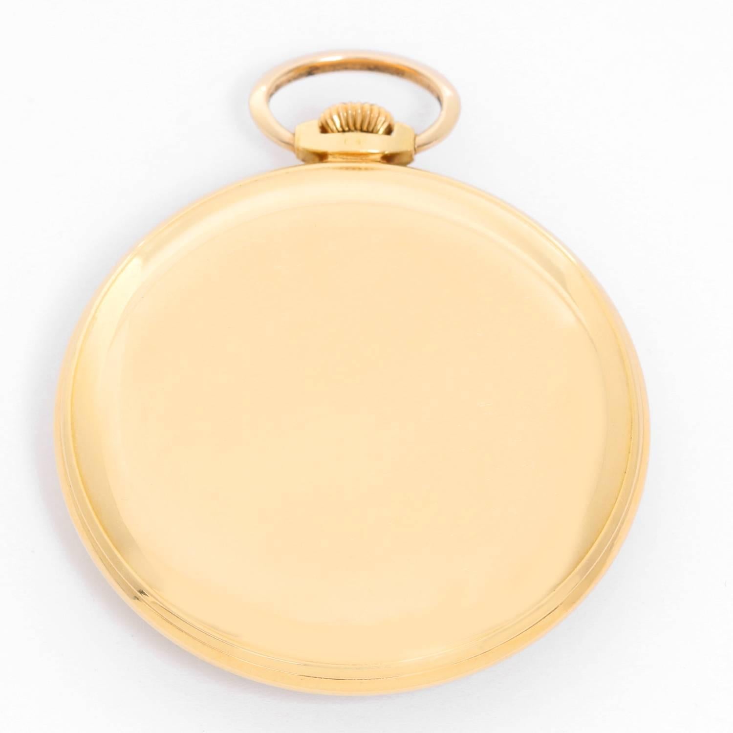 Patek Philippe & Co. 18K Gold Open Face Pocket Watch -  Manual movement. 18K Yellow Gold Case, monogrammed. Signed Patek Philippe & Co. ( 44 mm ). Gold with Arabic numerals; sub dial at 6' o clock.. Pre-owned with original certificate of origin and