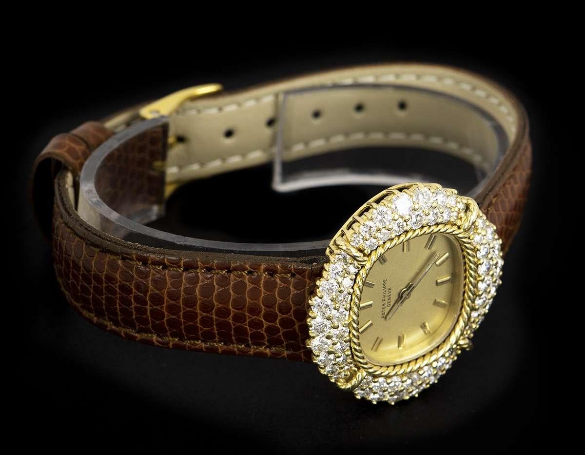 Patek Philippe Cocktail Ladies Gold Diamond Set 4277/1 Manual Wind Wristwatch In Good Condition In London, GB