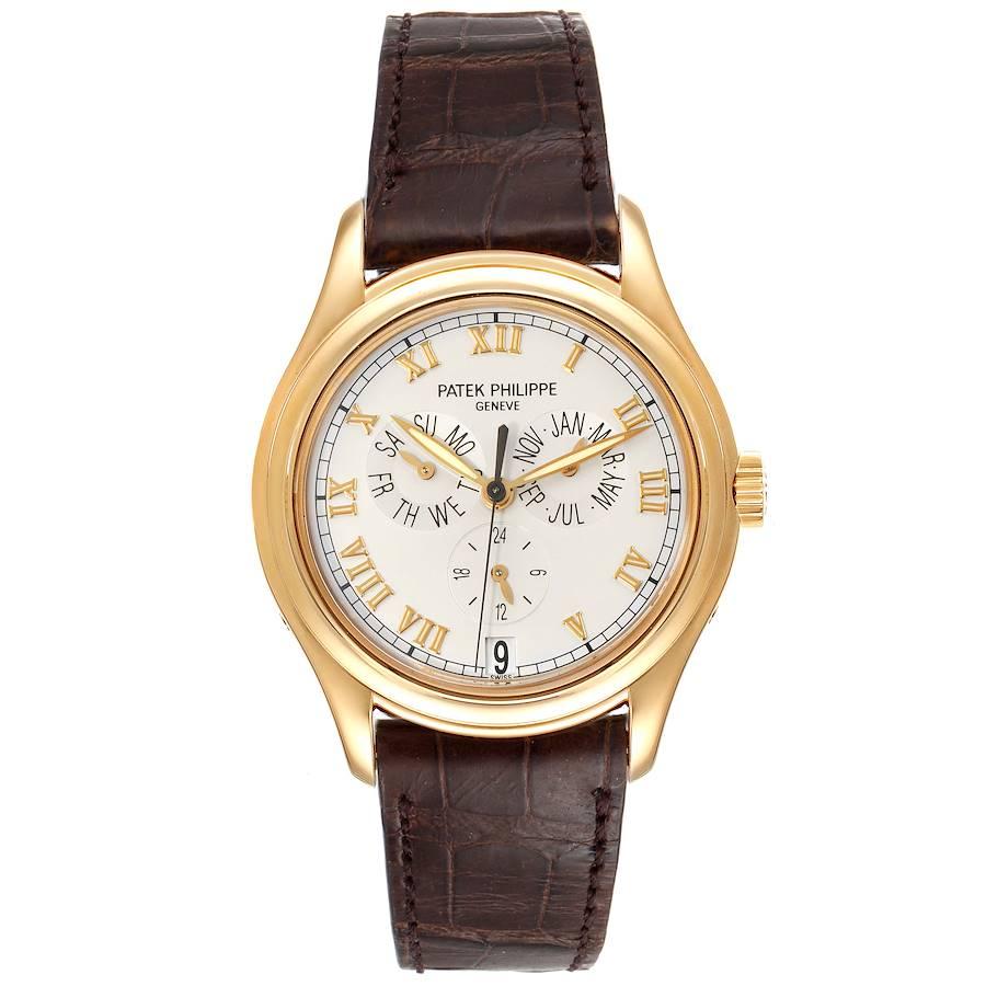 Patek Philippe Complicated Annual Calendar Yellow Gold Watch 5035 Box Papers. Automatic movement. Functions: annual calendar, date, day, month. Gyromax balance, shock absorber, self-compensating free-sprung flat balance spring, 21K gold rotor,
