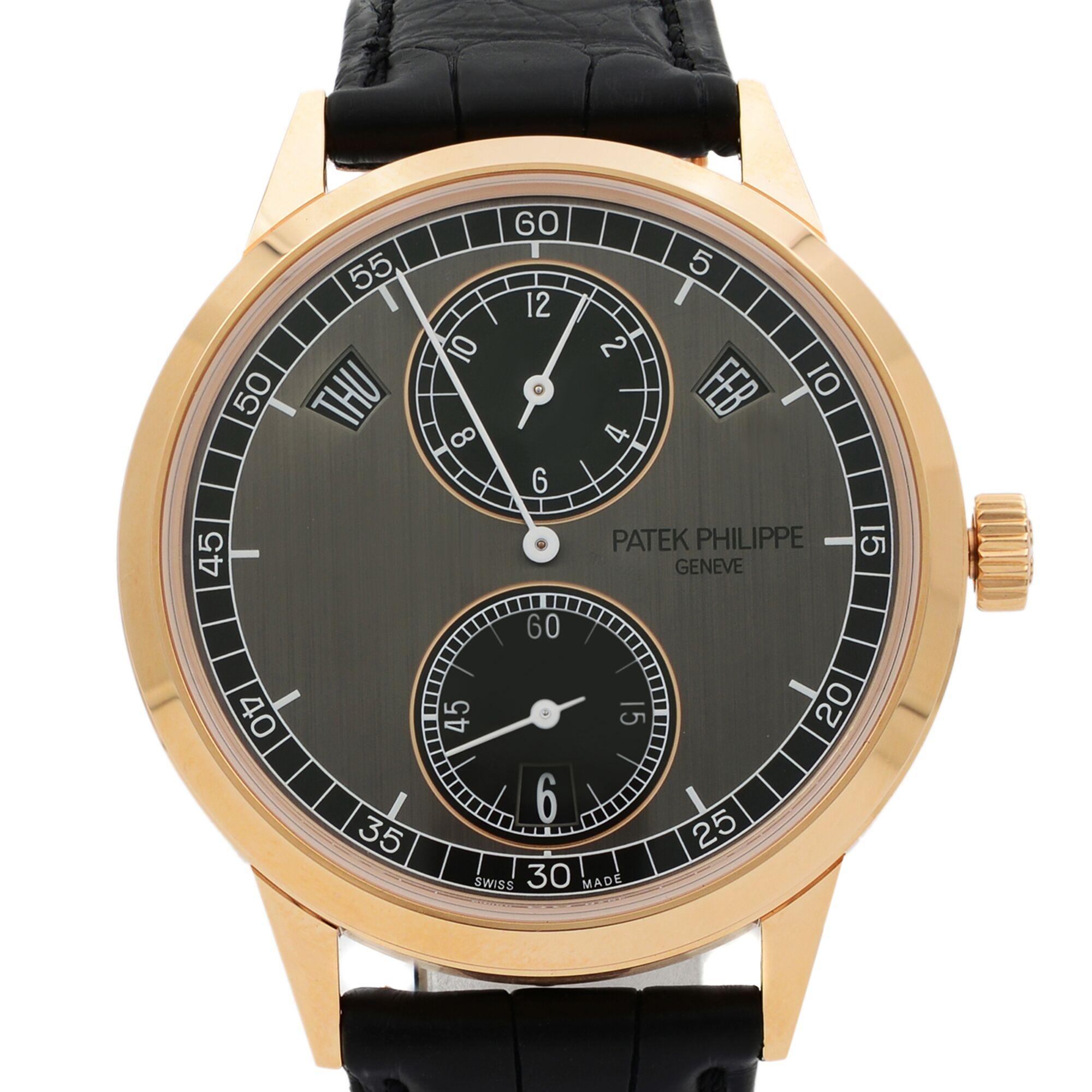 This never been worn Patek Philippe Complications 5235/50R-001 is a beautiful men's timepiece that is powered by mechanical (automatic) movement which is cased in a rose gold case. It has a round shape face, dial and has hand arabic numerals style