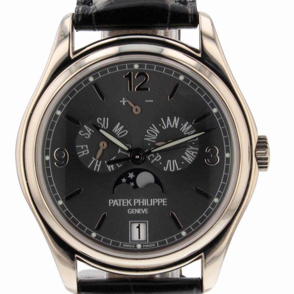 Patek Philippe Complications Reference #:5146/1G-010. Patek Philippe Complicated 39 mm 18K White Gold Watch 5146G-010 Mint. Verified and Certified by WatchFacts. 1 year warranty offered by WatchFacts.
