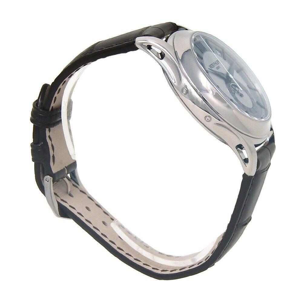 Brand: Patek Philippe
Band Color: Black	
Gender:	Men's
Case Size: 40-43.5mm	
MPN: Does Not Apply
Lug Width: 20mm	
Features:	12-Hour Dial, Date Indicator, Day Indicator, Month Indicator, Moon Phase, Non-Numeric Hour Marks, Sapphire Crystal, Swiss