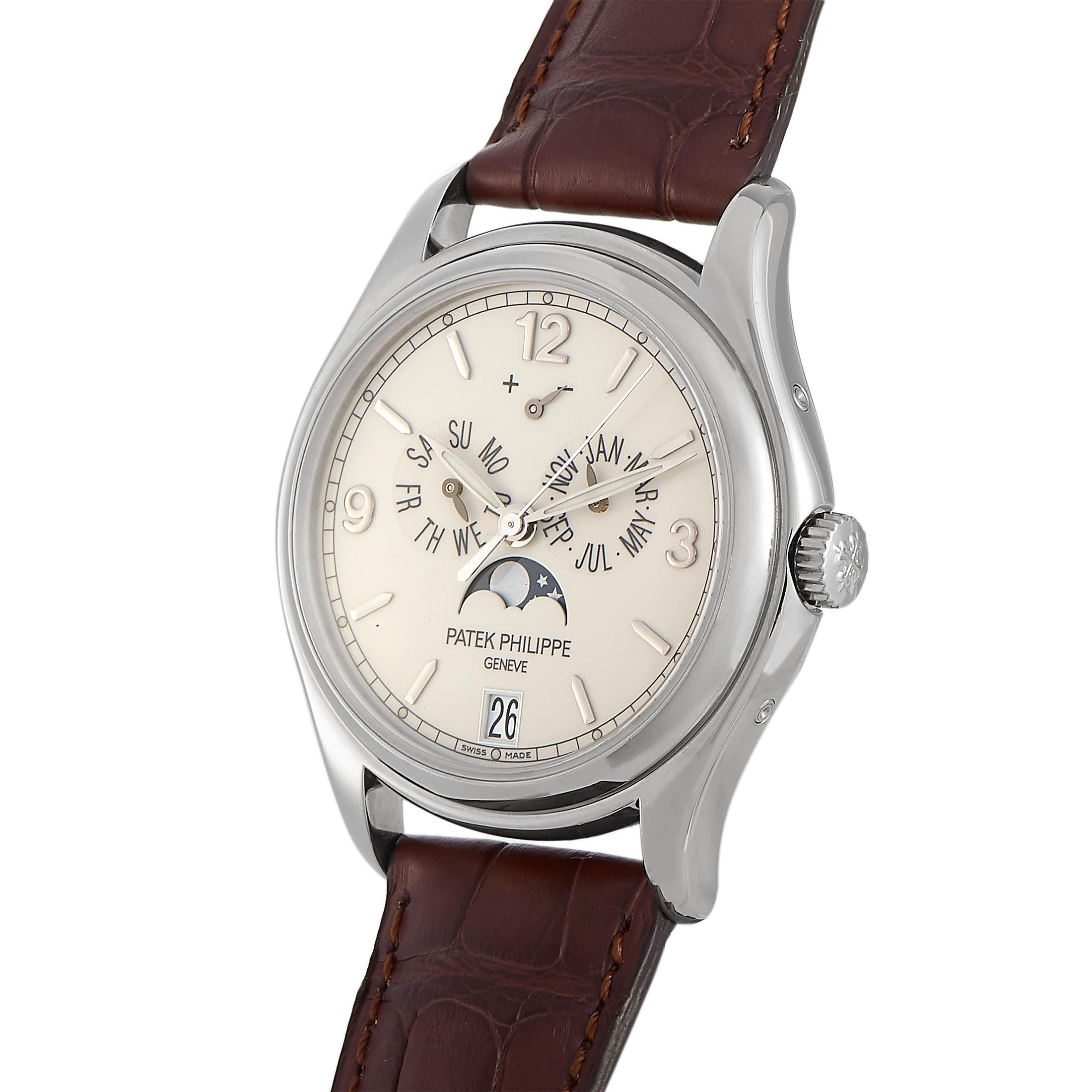 The Patek Philippe Complications Annual Calendar Moon Phase, reference number 5146G, is a member of the “Complications” collection.
 
 The watch is presented with a 39 mm 18K white gold case that boasts transparent sapphire crystal back. The case