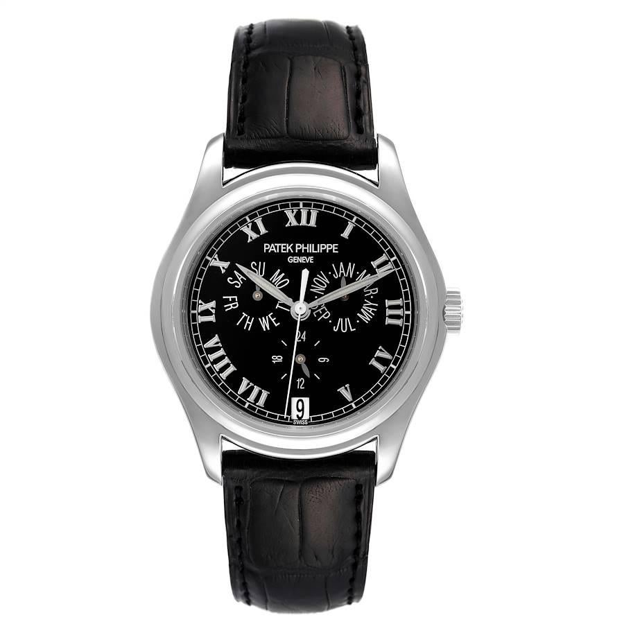 Patek Philippe Komplikationen Jahreskalender Platin Herrenuhr 5035P. Automatisches Uhrwerk. Funktionen: Jahreskalender, Datum, Tag, Monat. Gyromax-Unruh, Stoßdämpfer, selbstkompensierende, freischwingende, flache Unruhspirale, 21K-Goldrotor, Genfer