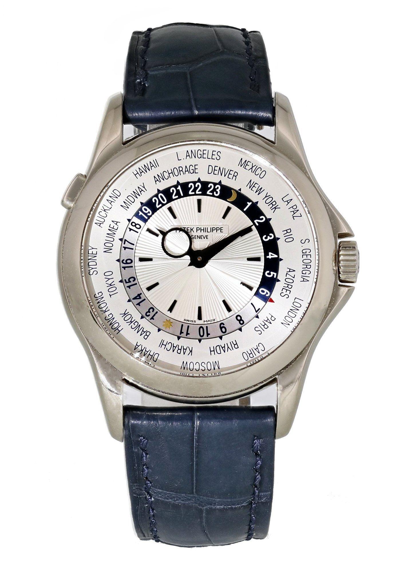 Patek Philippe Complications World Time 5110G-001 Men Watch.
37mm 18K White Gold case. 
White Gold Stationary bezel. 
Silver world time dial with gold hands and index hour markers. 
Blue Aligator Leather Strap with Deployment Clasp. 
Will fit up to