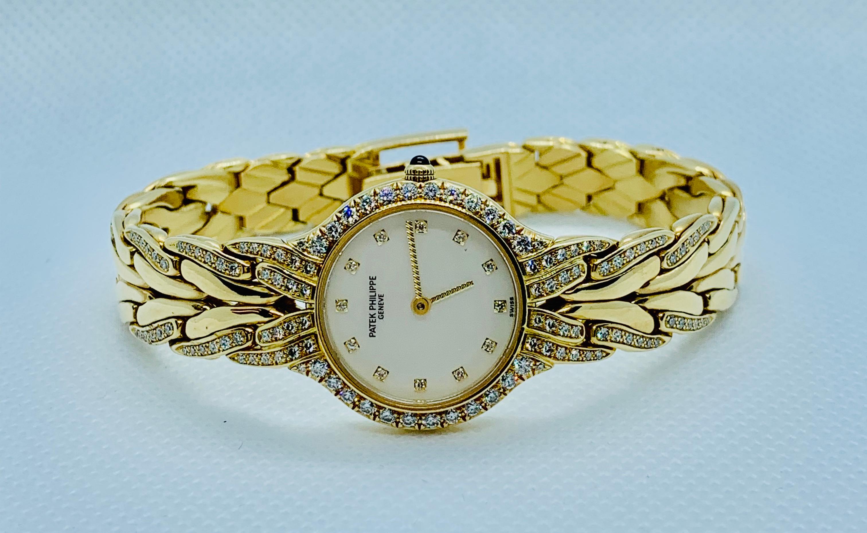 Patek Philippe Diamond and 18 Karat Yellow Gold La Flamme Ladies Watch 11