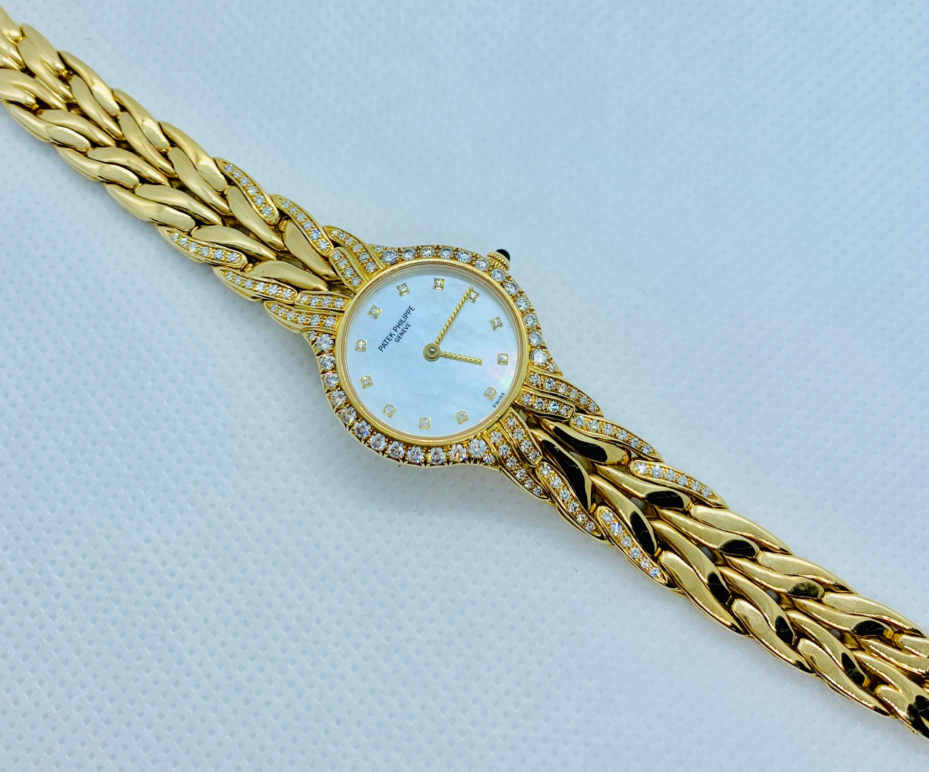 Patek Philippe Diamond and 18 Karat Yellow Gold La Flamme Ladies Watch 12