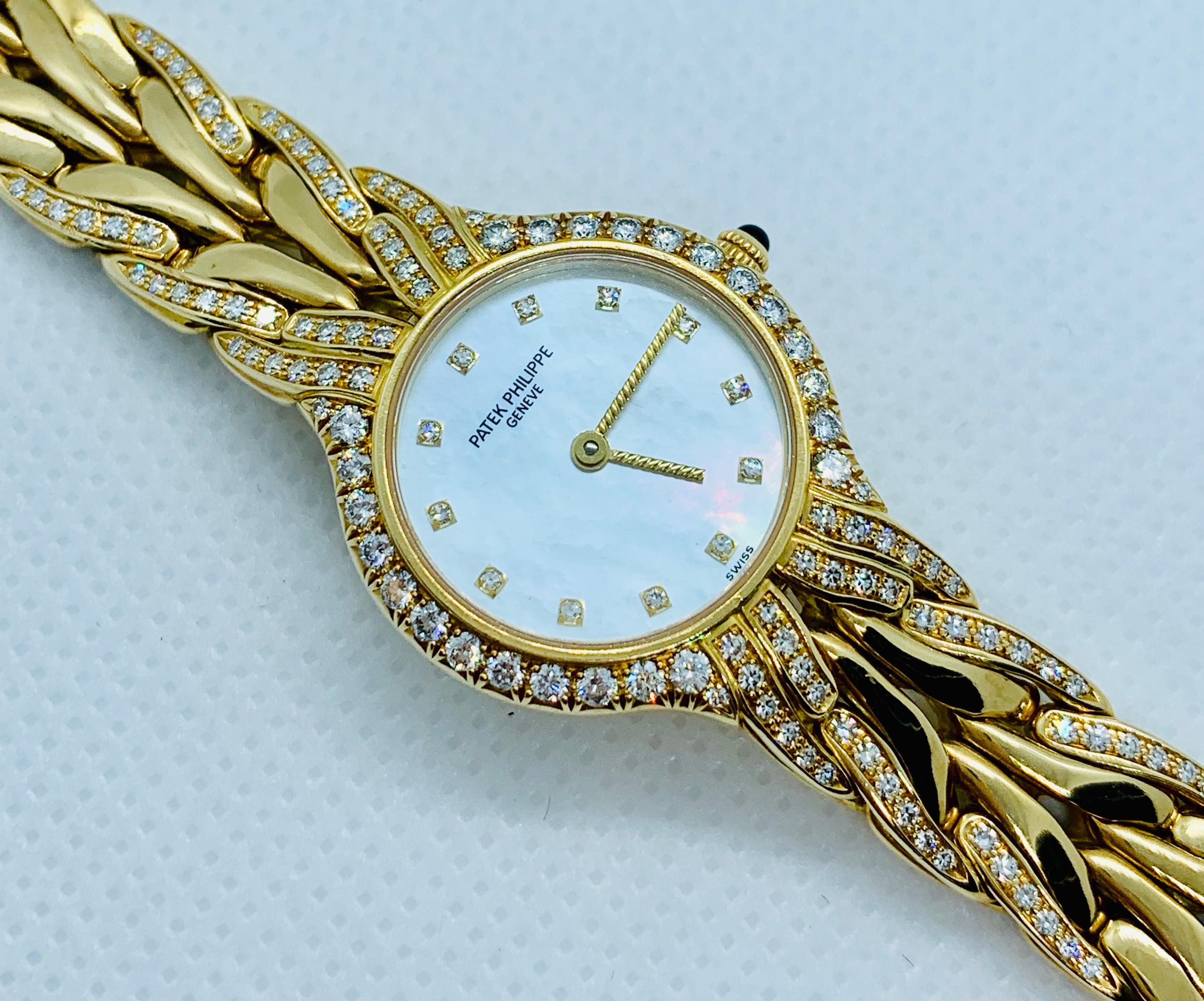 Patek Philippe Diamond and 18 Karat Yellow Gold La Flamme Ladies Watch 13