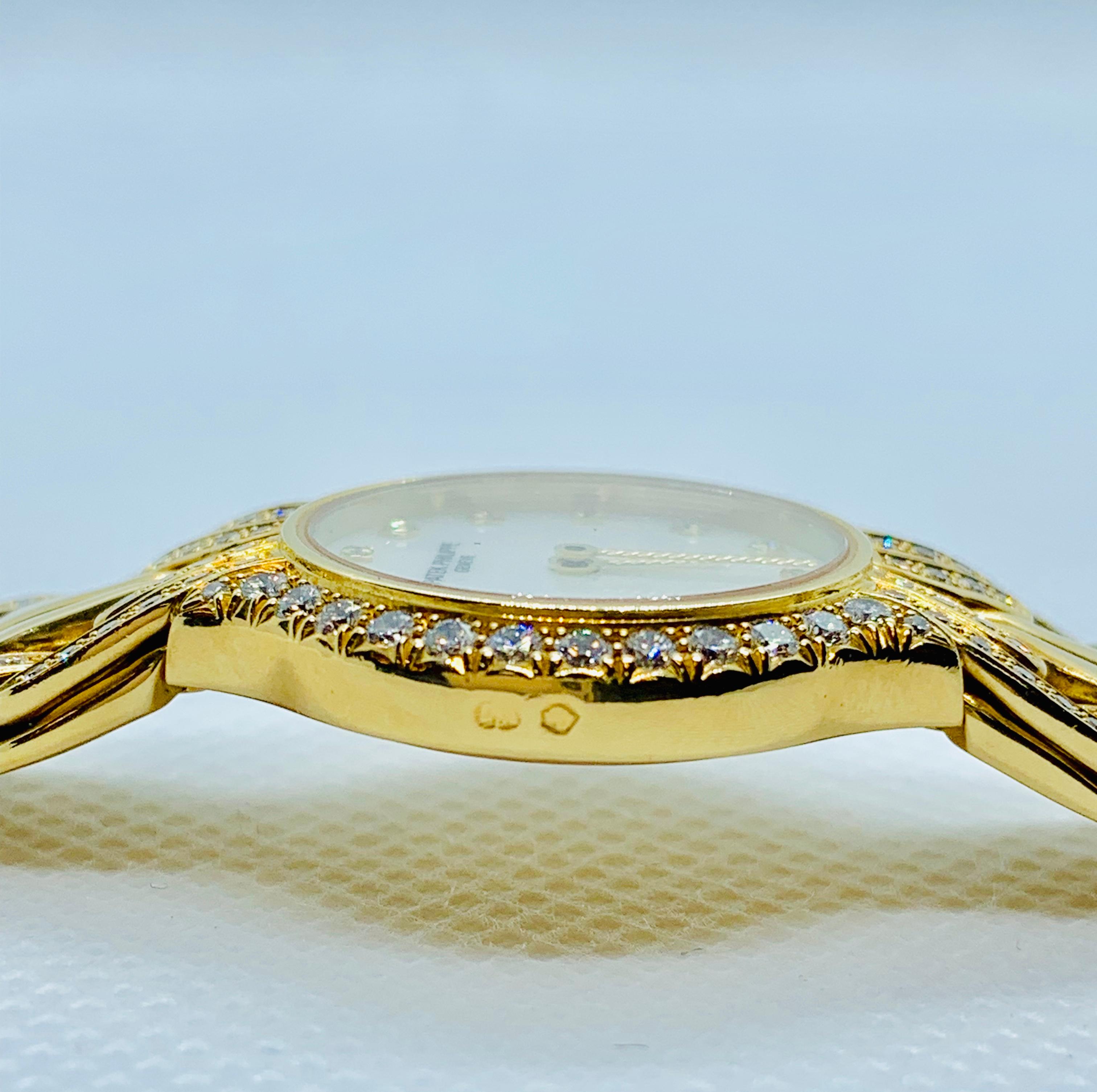 Women's Patek Philippe Diamond and 18 Karat Yellow Gold La Flamme Ladies Watch
