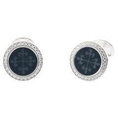 Patek Philippe Boutons de manchette Calatrava en or blanc 18 carats, diamants et onyx 2059108G001