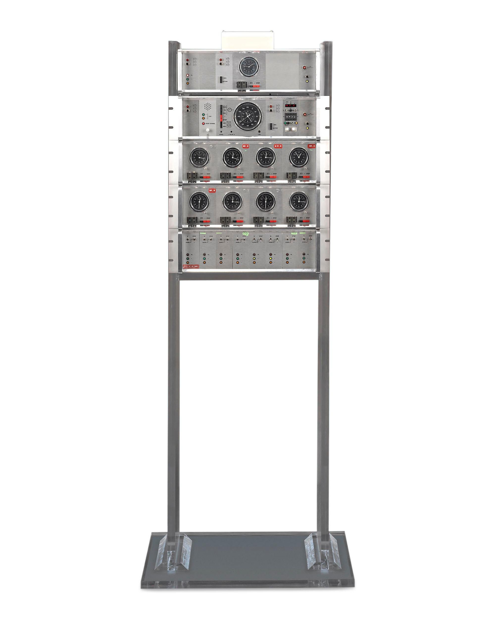Originally made for Dutch National Railways, this incredibly rare Patek Philippe electronic clock system represents the cutting edge in horological technology. The unique system features a master clock designed to be synchronized with a central