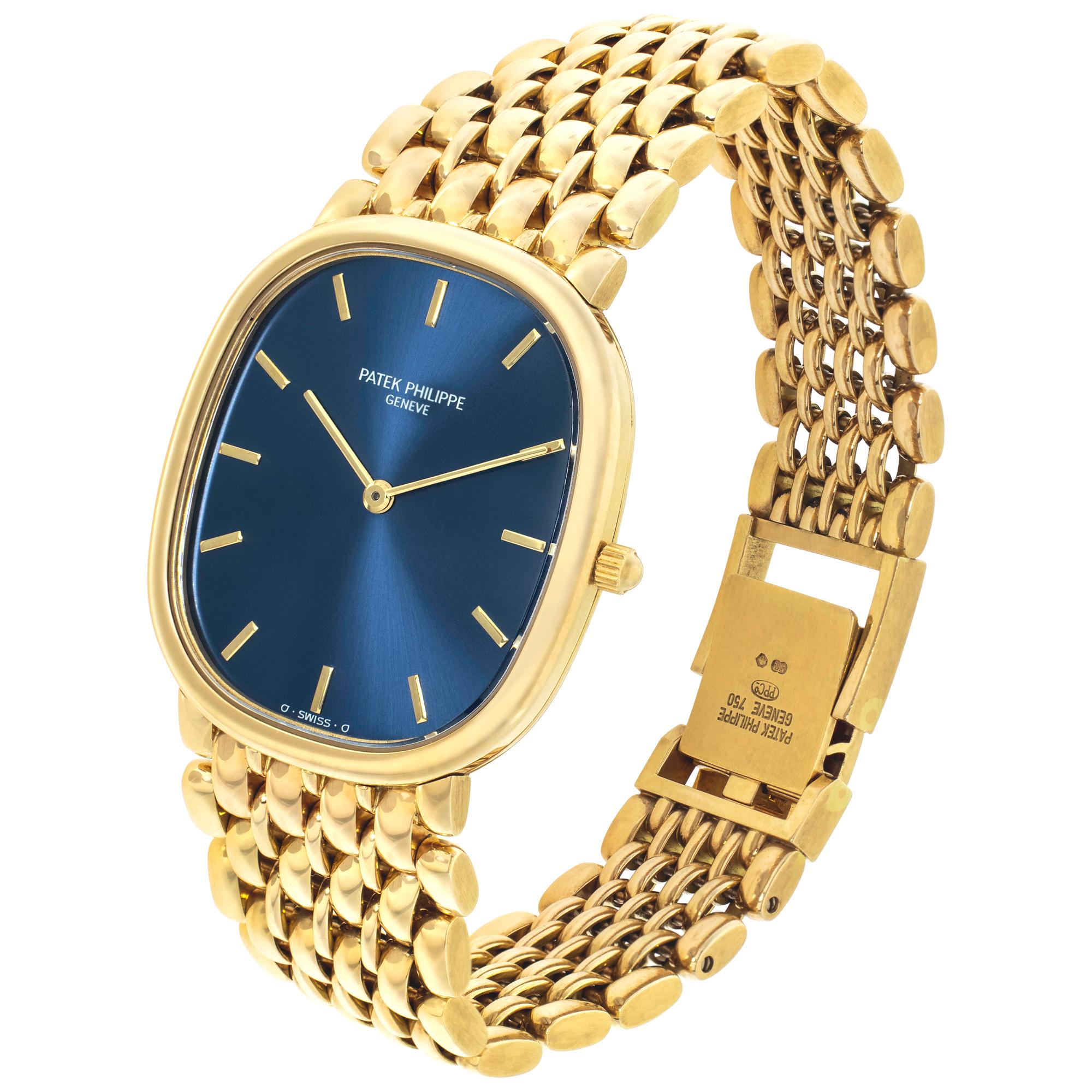 Patek Philippe Golden Ellipse with iconic blue stick dial in 18k. Auto. 34 mm length by 30 mm width case size. Ref 3738/122. Circa 1990s. Fine Pre-owned Patek Philippe Watch.

 Certified preowned Dress Patek Philippe Ellipse 3738/122 watch is made
