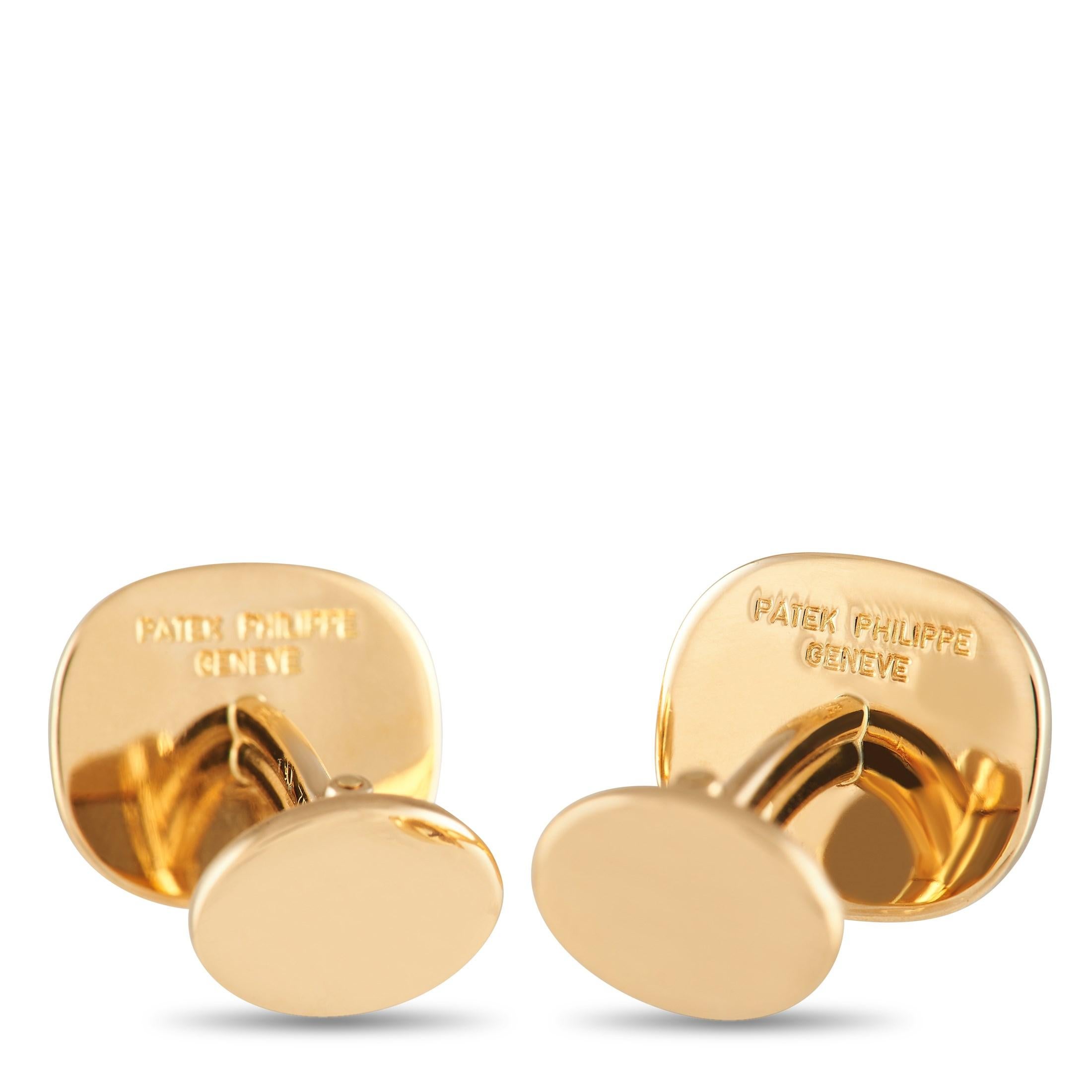 Simple and sophisticated in design, these Patek Philippe Ellipse Cufflinks are ready to provide any suited ensemble with a luxurious finishing touch. Crafted from 18K Yellow Gold, each oval-shaped cufflink measures 0.65” long and 0.50” wide.

This