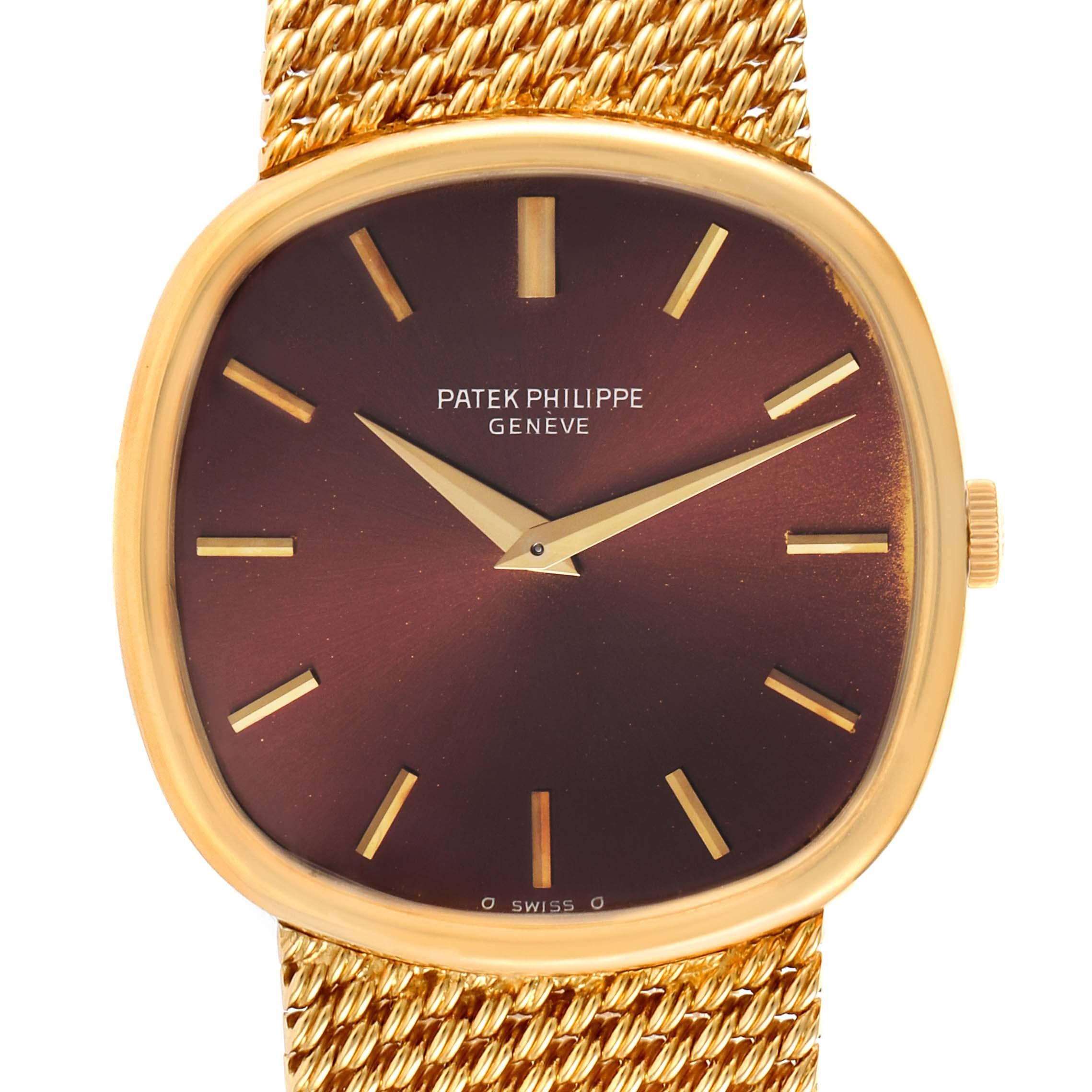Patek Philippe Ellipse 18k Yellow Gold Reddish Brown Dial Watch 3844 Papers. Manual winding movement. Rhodium-plated, fausses cotes decoration, straight-line lever escapement, Gyromax balance adjusted for heat, cold, isochronism and five positions,