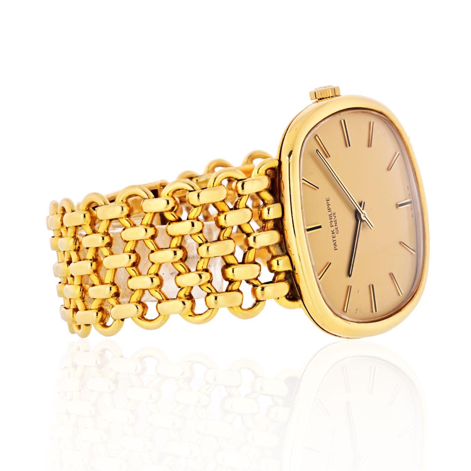 18K Yellow Gold Patek Philippe Ellipse Wrist Watch. 
Case Diameter: 33mm (without crown)
Case Thickness: 7mm
Bracelet Lenght: 6.25 inches
Fold over clasp.
No box/papers, will be shipped in a beautiful watch Box and Certified Appraisal.