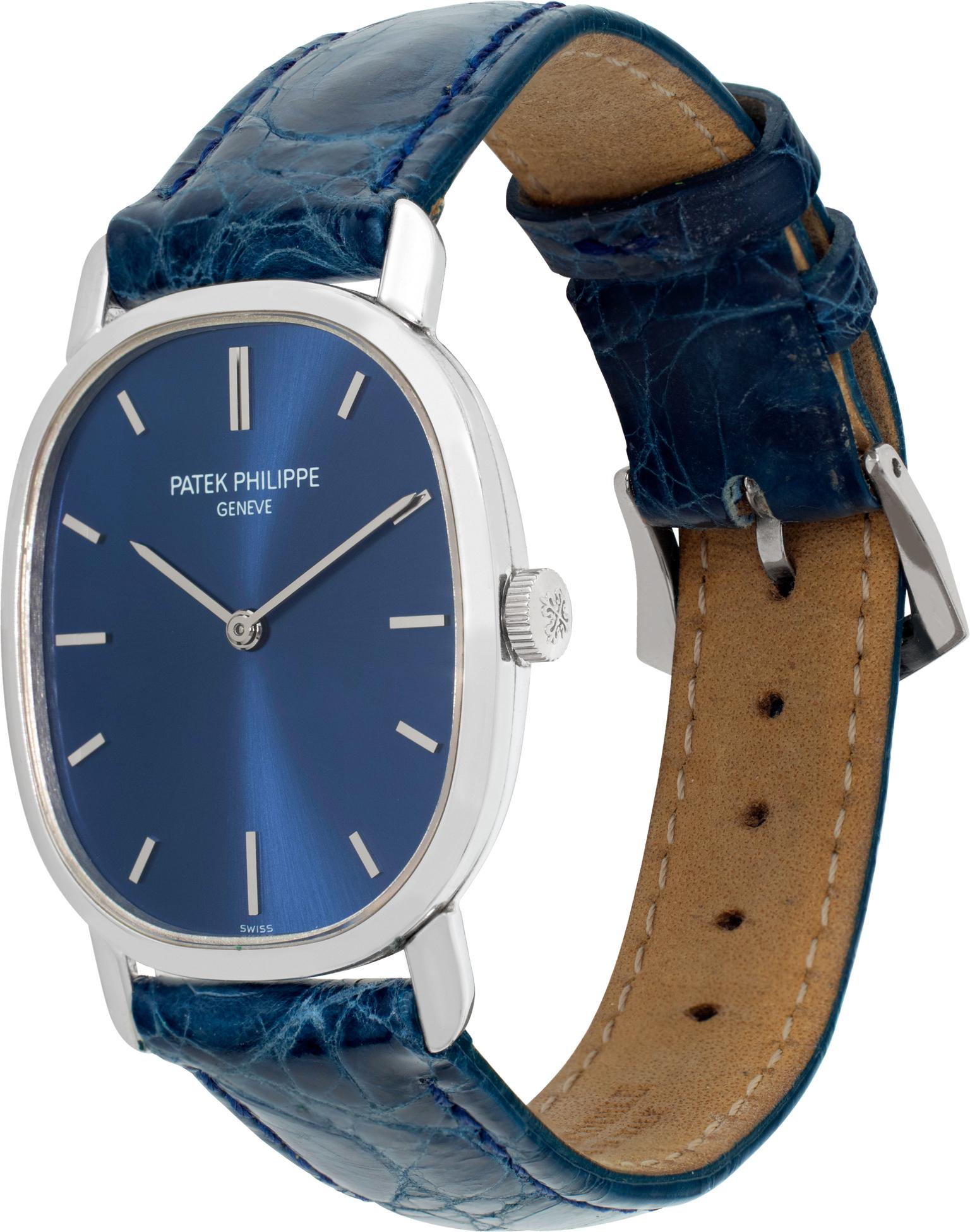 Patek Philippe Ellipse in 18k white gold on a blue alligator strap with Patek tang buckle. Manual. 32 mm length by 27 mm width case size. Ref 3548. Fine Pre-owned Patek Philippe Watch.

 Certified preowned Classic Patek Philippe Ellipse 3548 watch