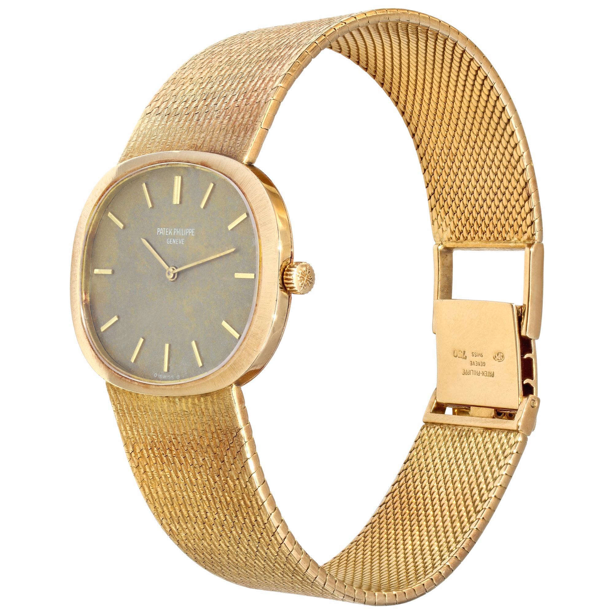 Patek Philippe Ellipse in 18k yellow gold with beautiful patina on dial. Manual. 34 mm x 23 mm case size. Will fit up to a 7