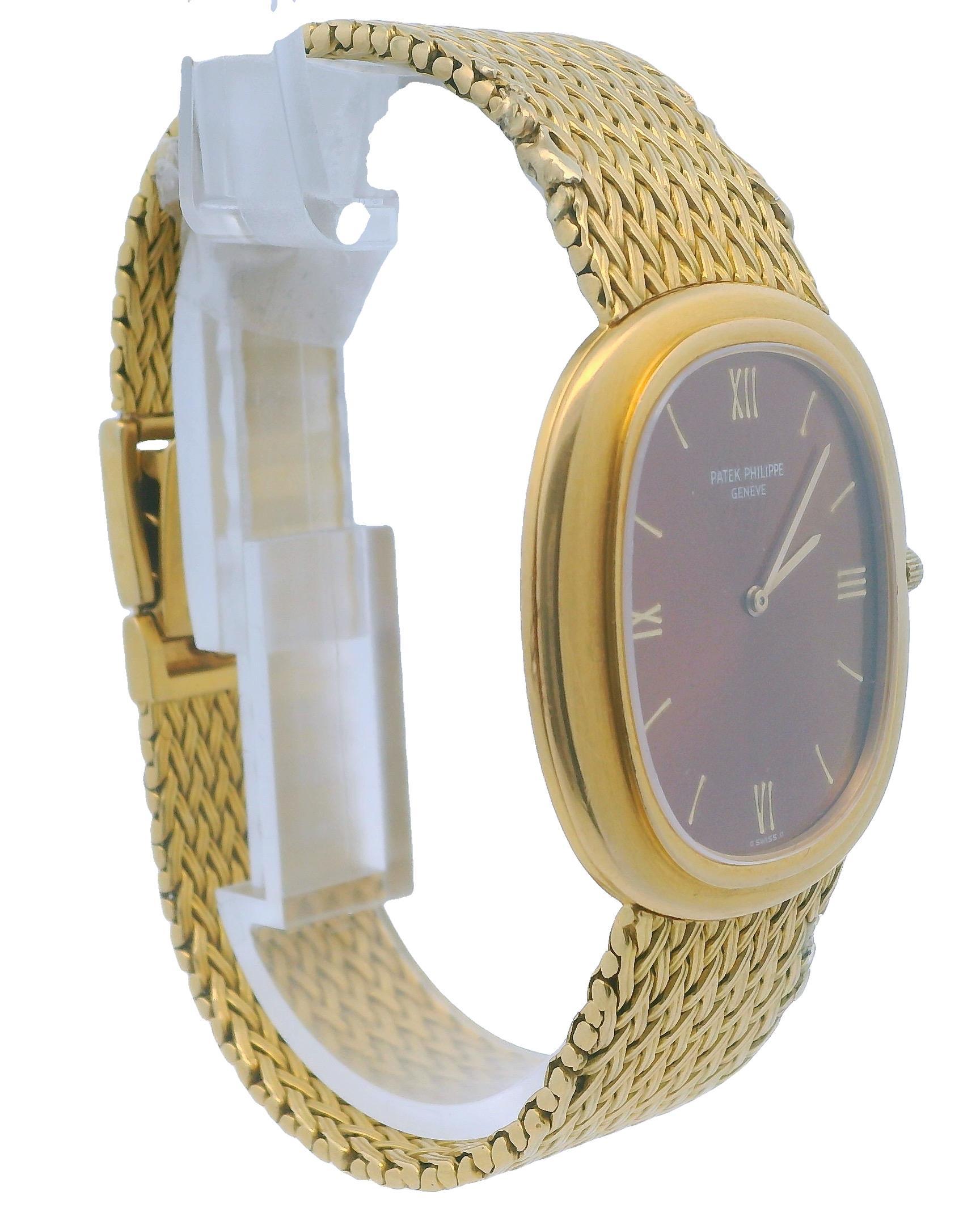 Patek Philippe Ellipse 3589/1 18K Yellow Gold Bronze Dial Watch In Good Condition For Sale In Great Neck Plaza, NY